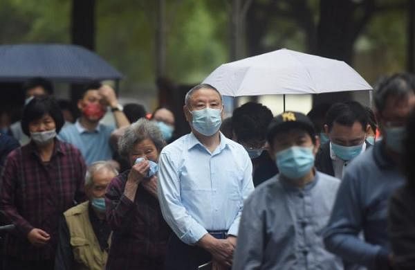 China says it's been 'open and transparent' on COVID origins-